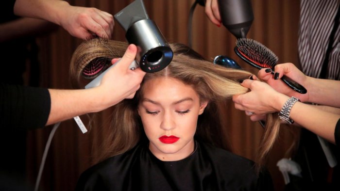 Model Gigi Hadid is prepared backstage before the Brandon Maxwell Fall/Winter 2018 collection presentation at New York Fashion Week in Manhattan, New York, US, February 11, 2018. Credit: Reuters File Photo