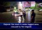 Gujarat: Car stuck in water-logged area, retrieved